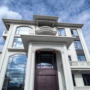 林芝白麻别墅外墙干挂石材效果示例