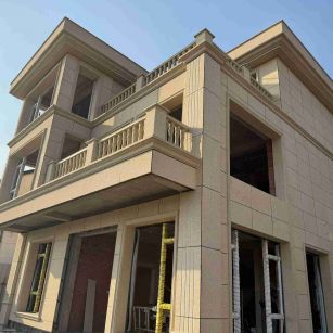 林芝 黄金麻花岗岩石材荔枝面外墙干挂效果展示