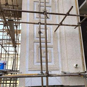 林芝 黄金麻花岗岩别墅外墙干挂回纹造型效果