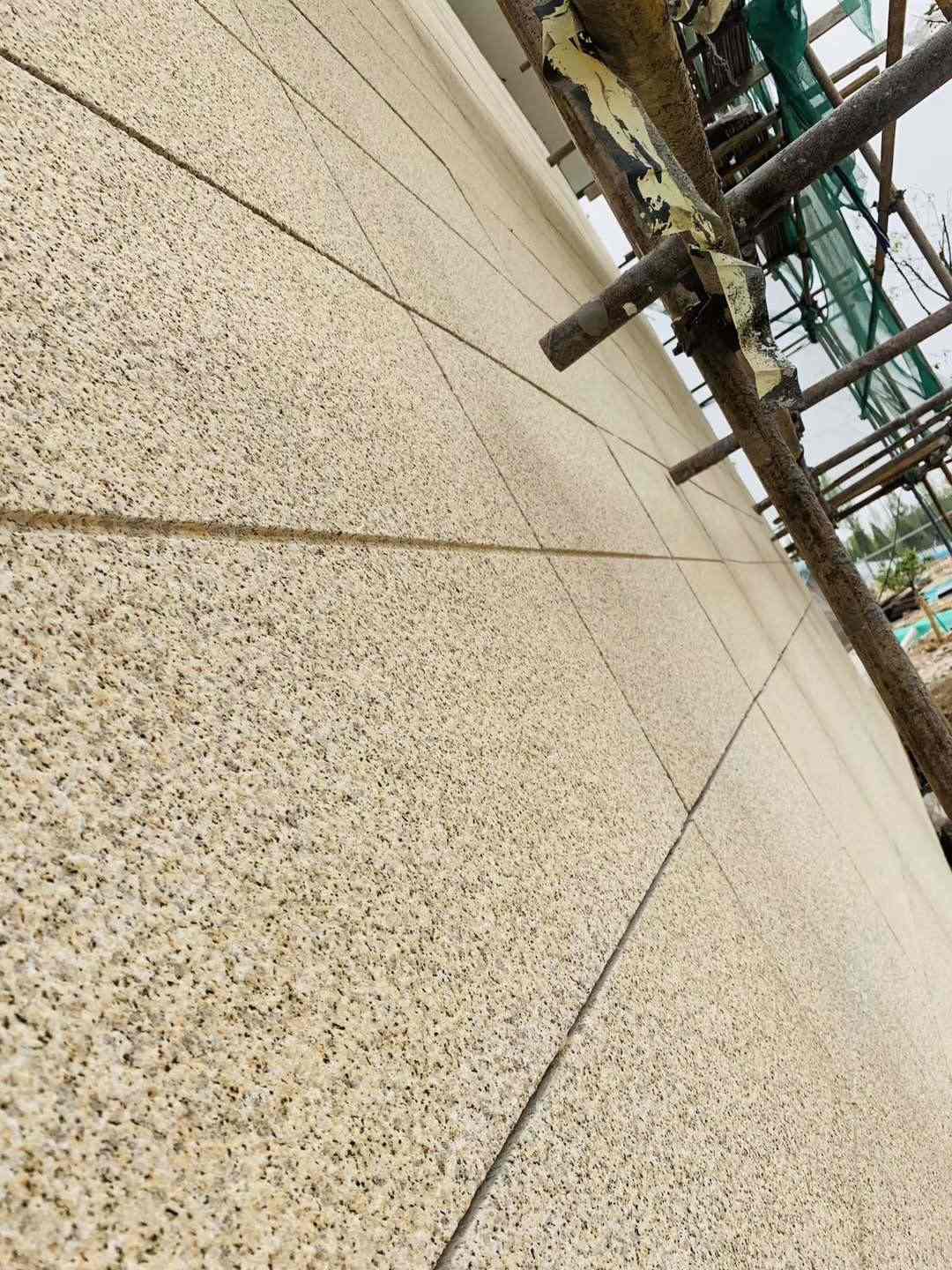 林芝 黄金麻花岗岩荔枝面外墙干挂石材效果示例